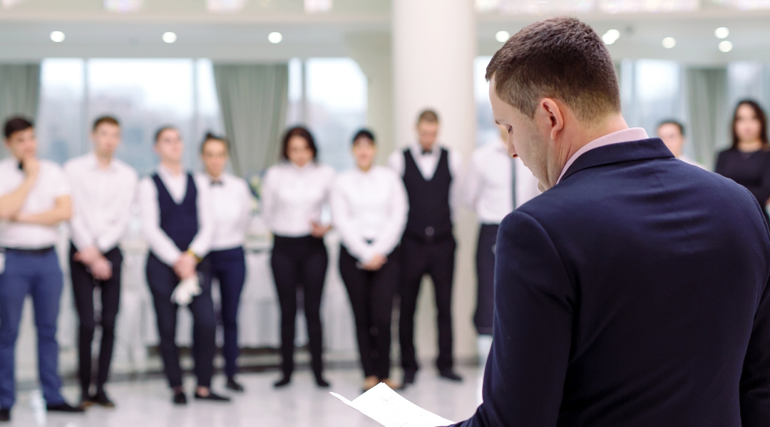 banquet houseman giving instructions to banquet staff