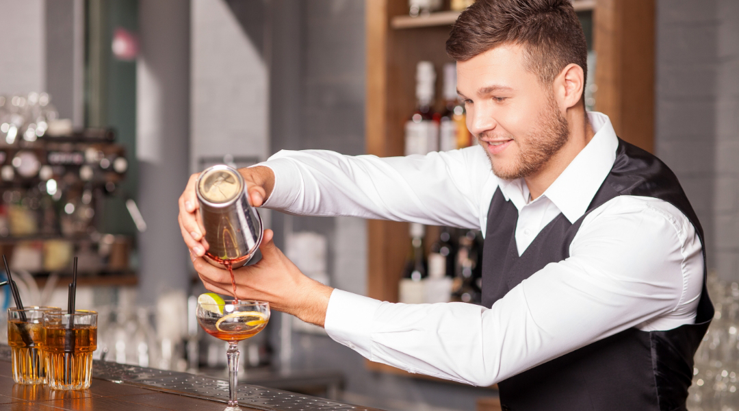 bartender pouring a drink