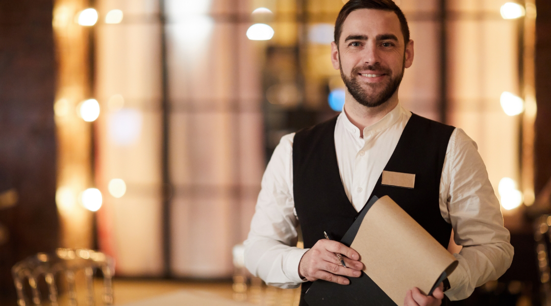 waiter ready to seat customers